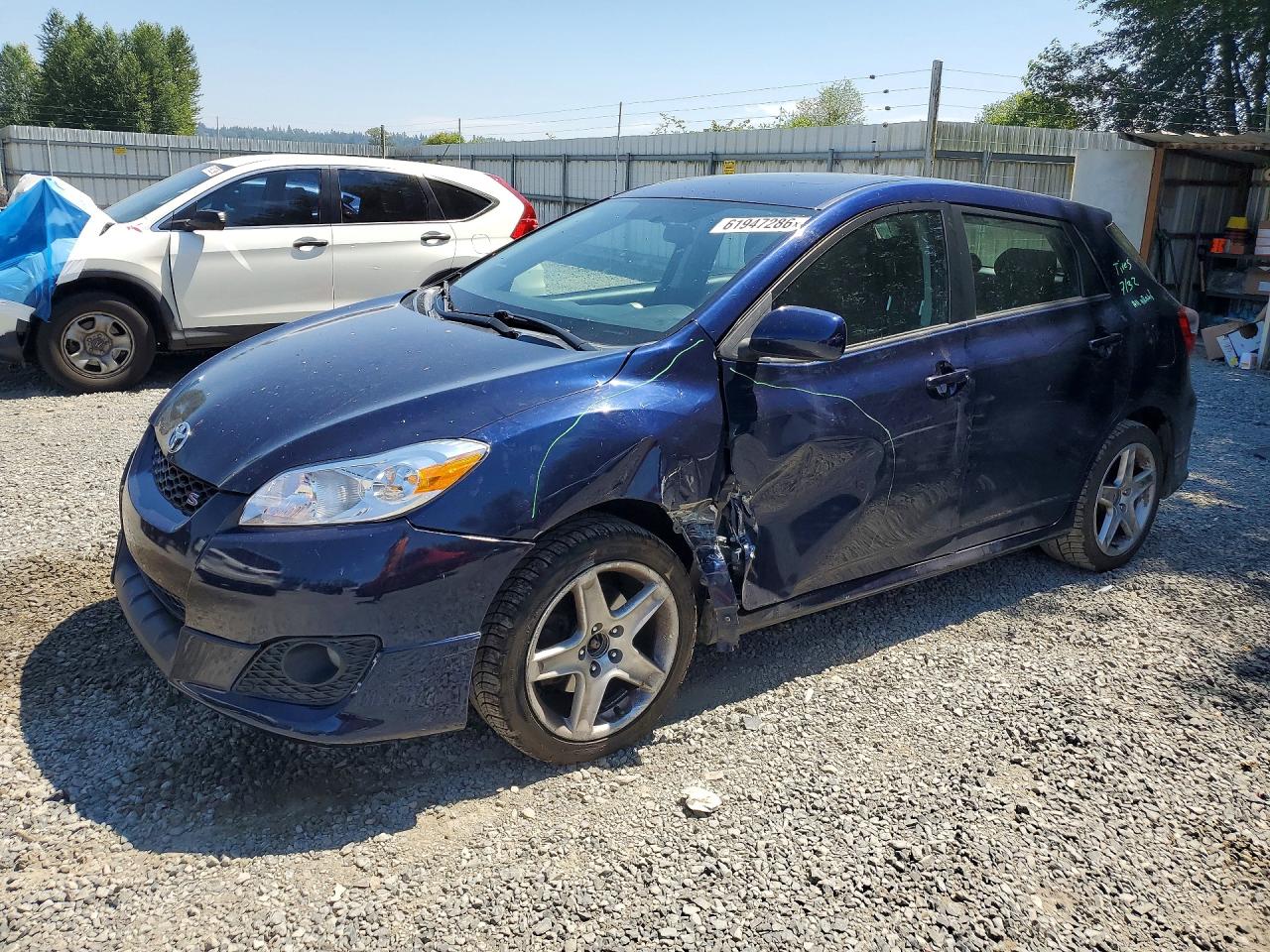 2009 Toyota Matrix S, VIN 2T1LE40E49C002967 — Side