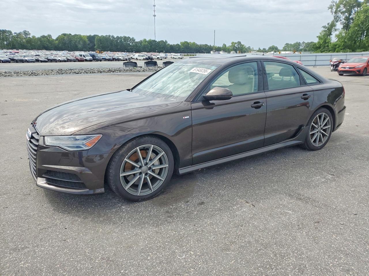 2018 Audi A6 Premium Plus, VIN WAUG8AFC8JN013613 — Бок