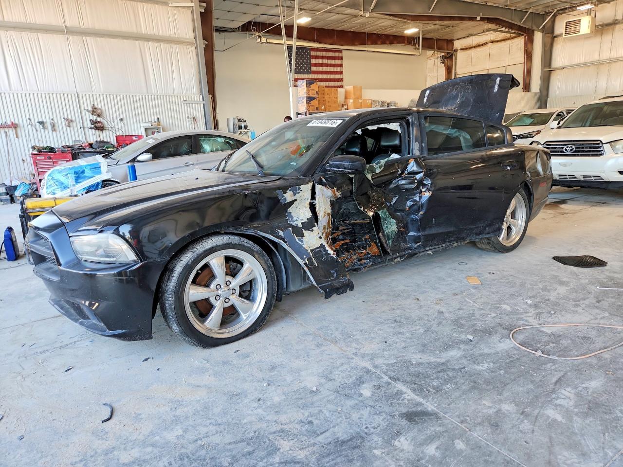 2011 Dodge Charger RT Max, VIN 2B3CL5CT7BH503015 — Side