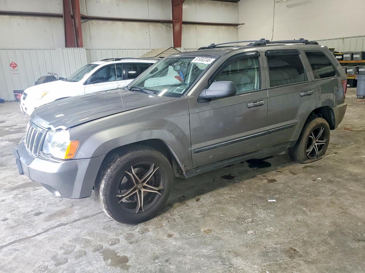 2008 Jeep Grand Cherokee Laredo, VIN 1J8GR48K68C103833 — Vandalism