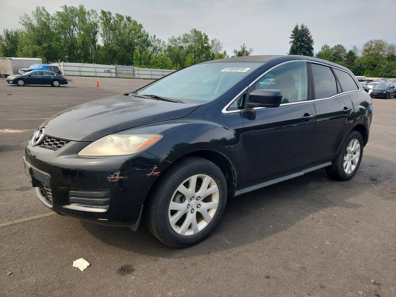 2009 Mazda CX-7 Touring, VIN JM3ER29L590225216 — Front end
