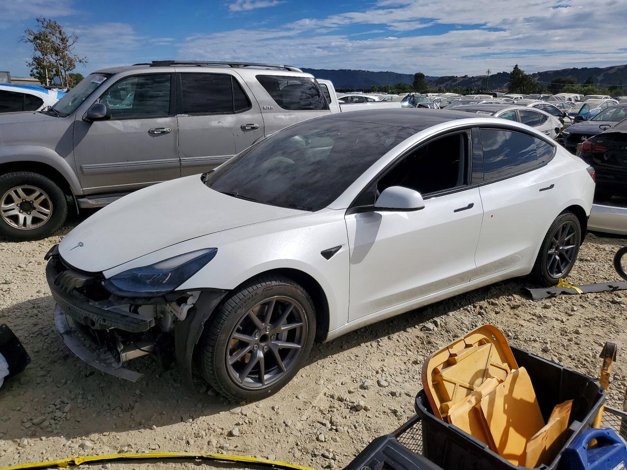 2021 Tesla Model 3 Standard Range Plus, VIN 5YJ3E1EA1MF052136 — Stripped