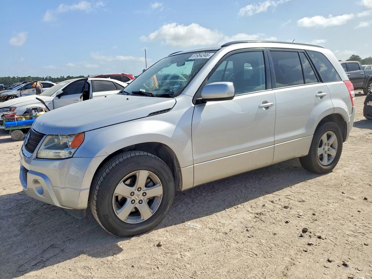 2009 Suzuki Grand Vitara, VIN JS3TE044494100783 — Зад