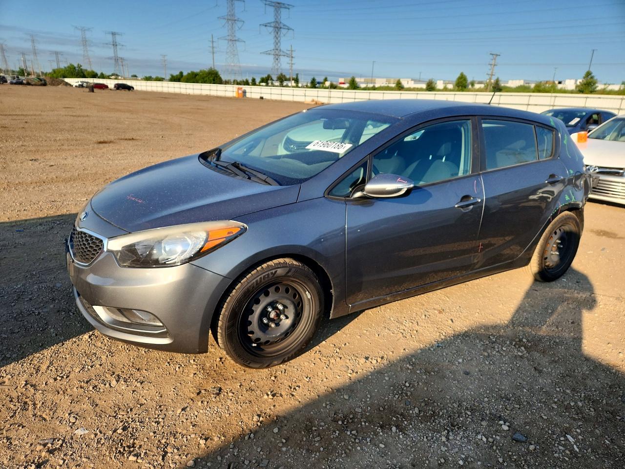 2016 Kia Forte LX, VIN KNAFK5A85G5637465 — Зад