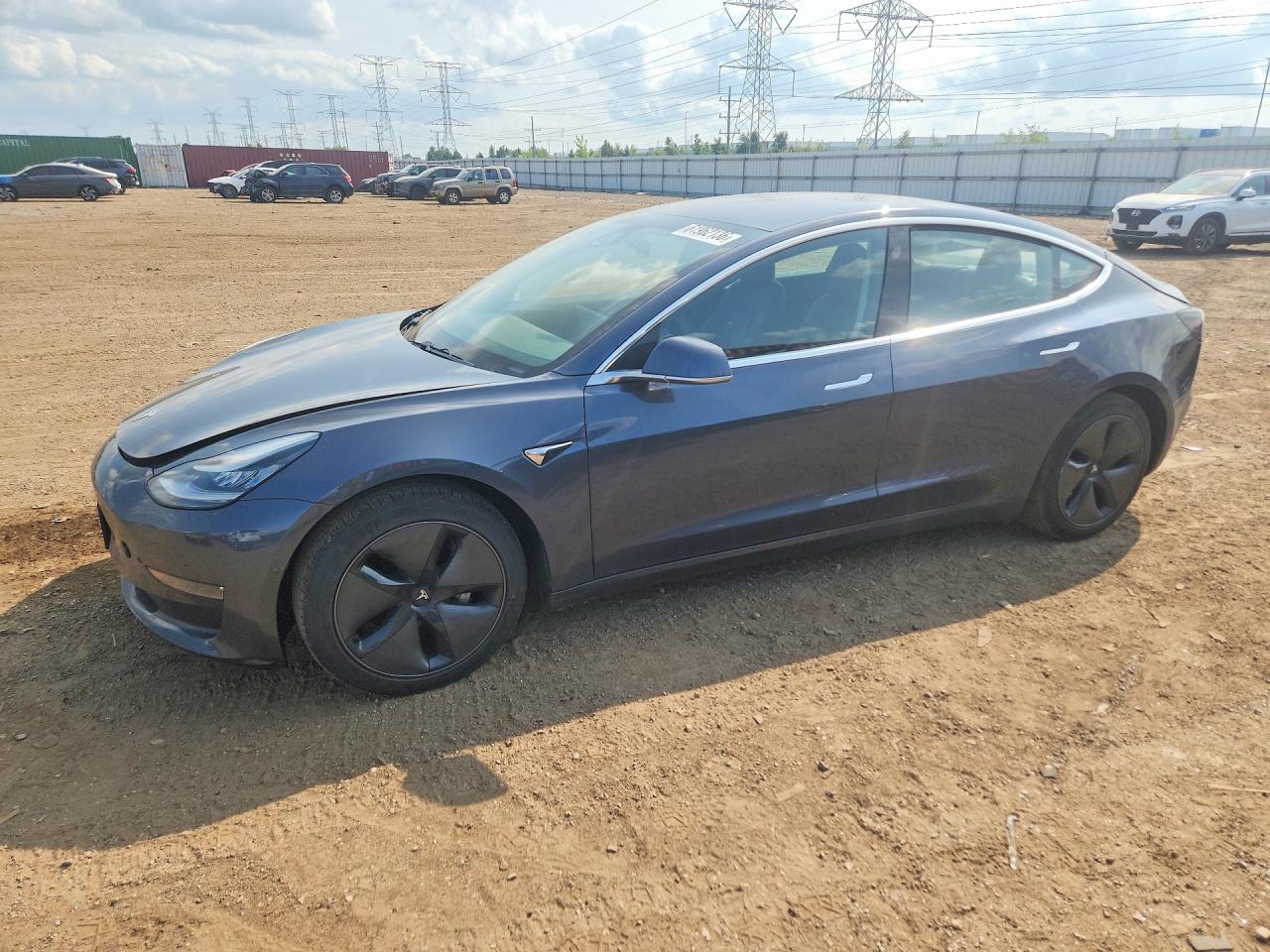 2018 Tesla Model 3 Long Range Battery, VIN 5YJ3E1EA7JF043288 — Зад