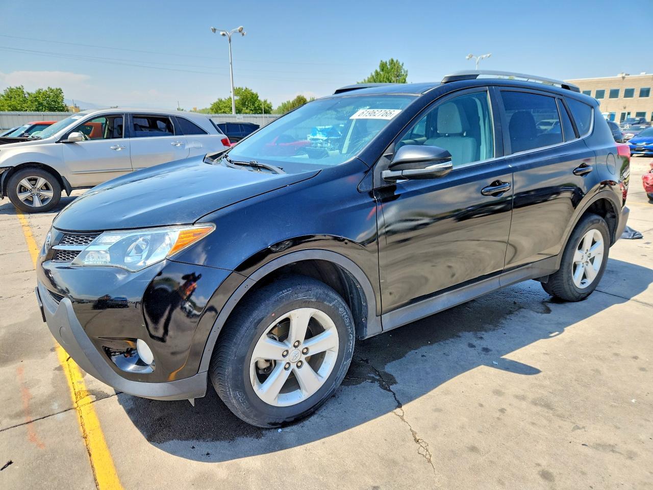 2013 Toyota RAV4 XLE, VIN 2T3RFREV0DW101846 — Град