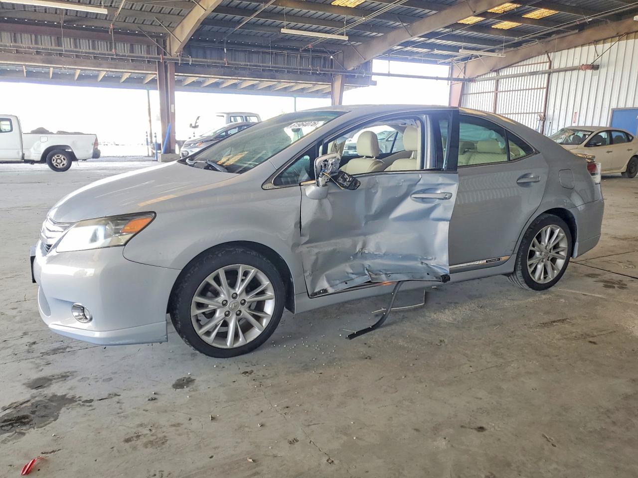 2010 Lexus HS 250h Premium, VIN JTHBB1BA1A2019188 — Side