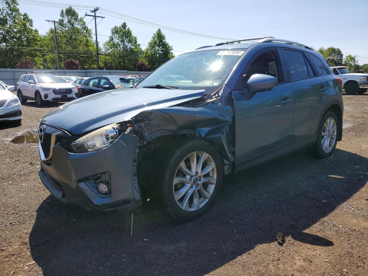 2014 Mazda CX-5 Grand Touring, VIN JM3KE4DY8E0421657 — Front end