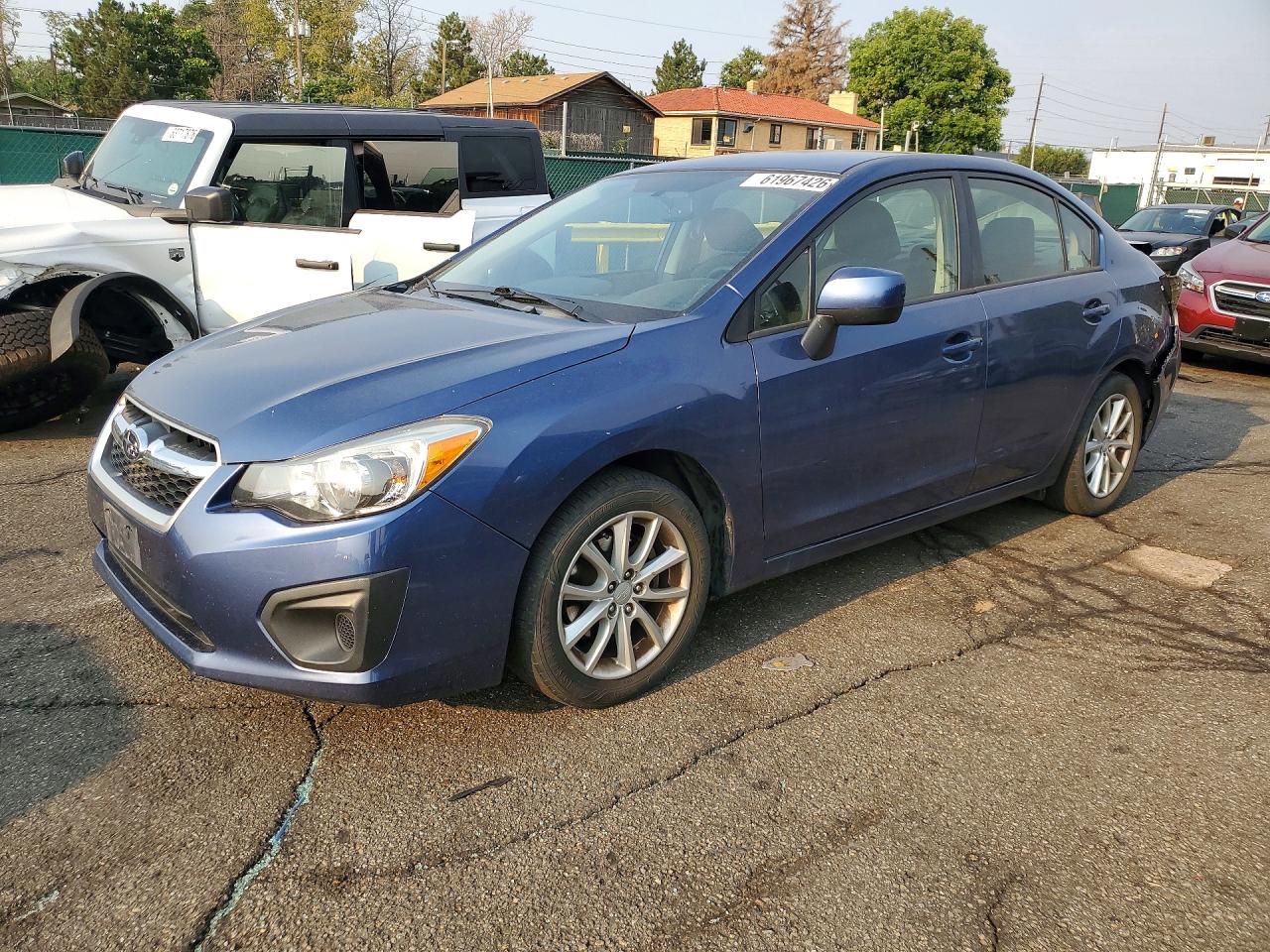 2013 Subaru Impreza Premium, VIN JF1GJAC64DH024977 — Rear end