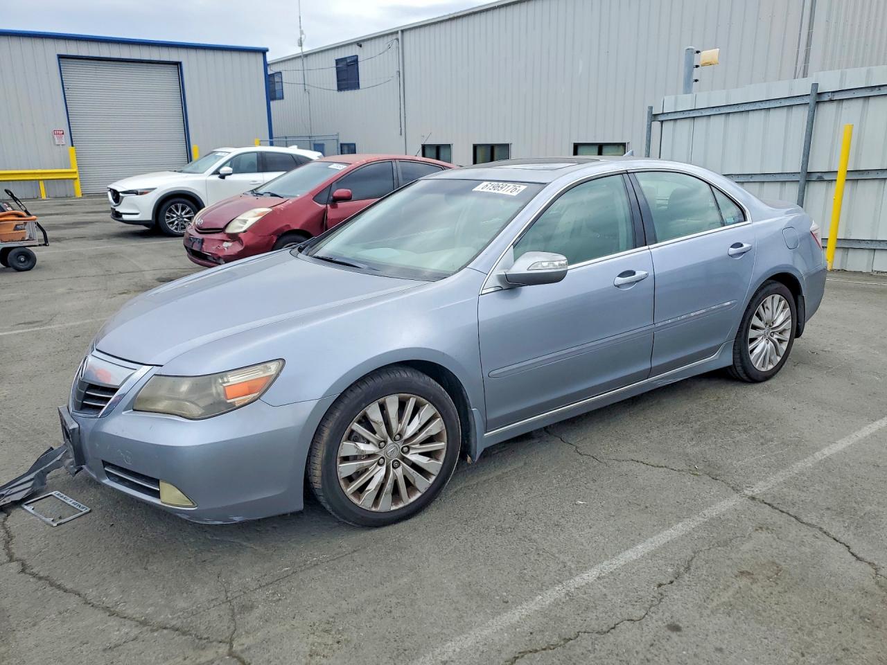 2011 Acura RL Technology, VIN JH4KB2F62BC000902 — Side