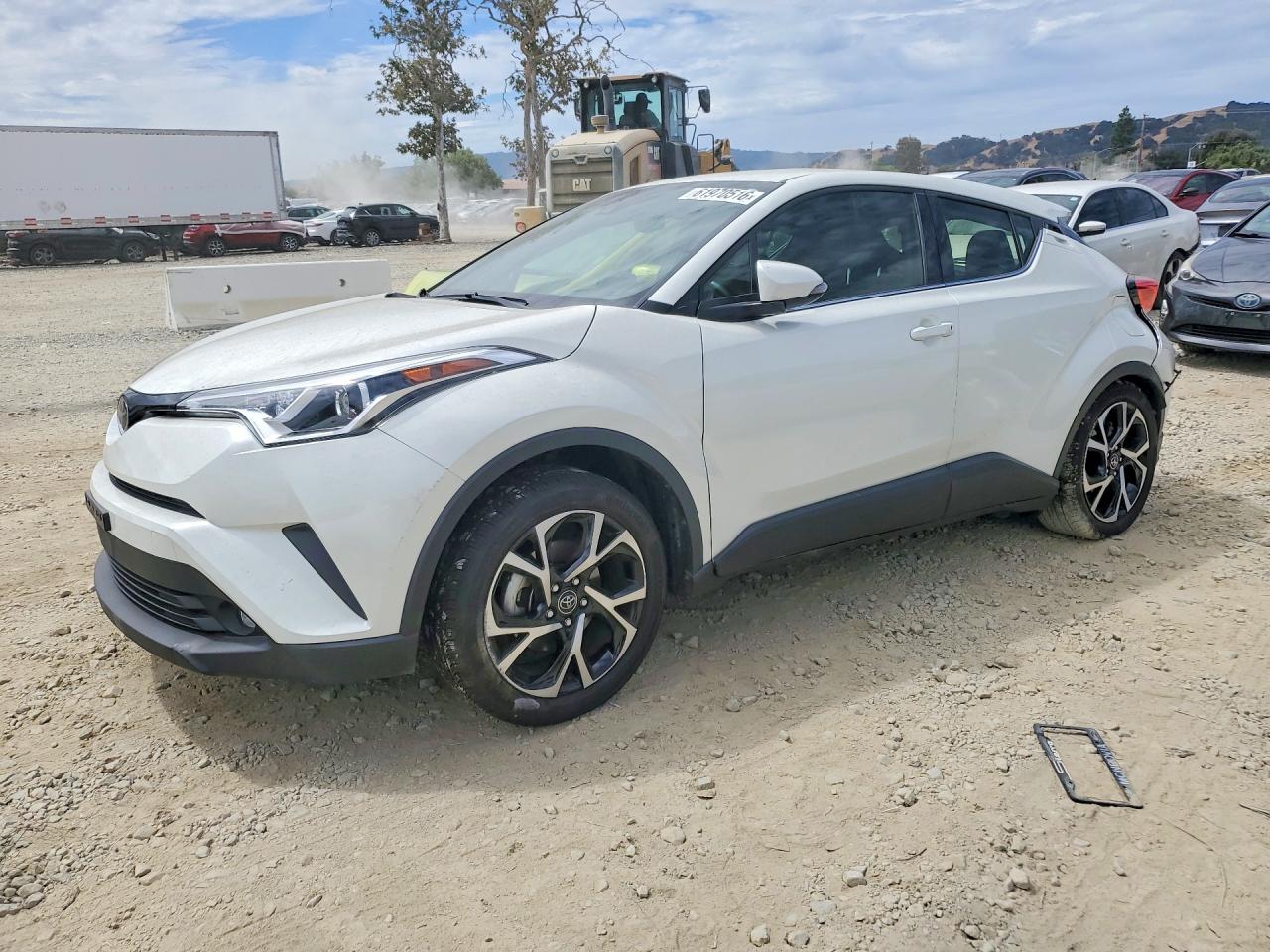2019 Toyota C-HR XLE, VIN JTNKHMBX7K1062300 — Зад