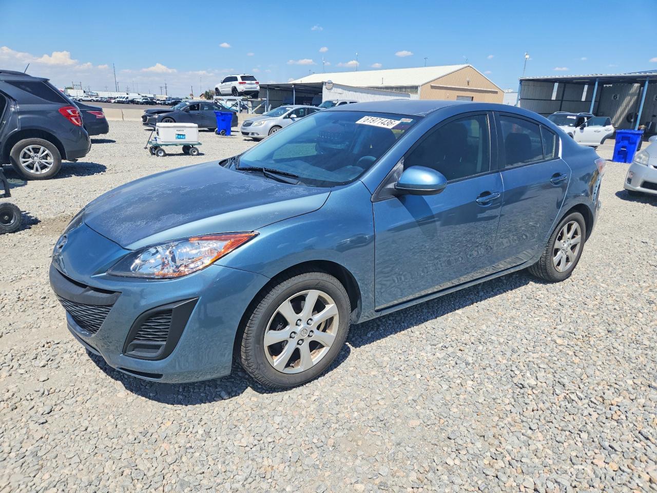 2011 Mazda 3 i Touring, VIN JM1BL1VF5B1489303 — Rear end