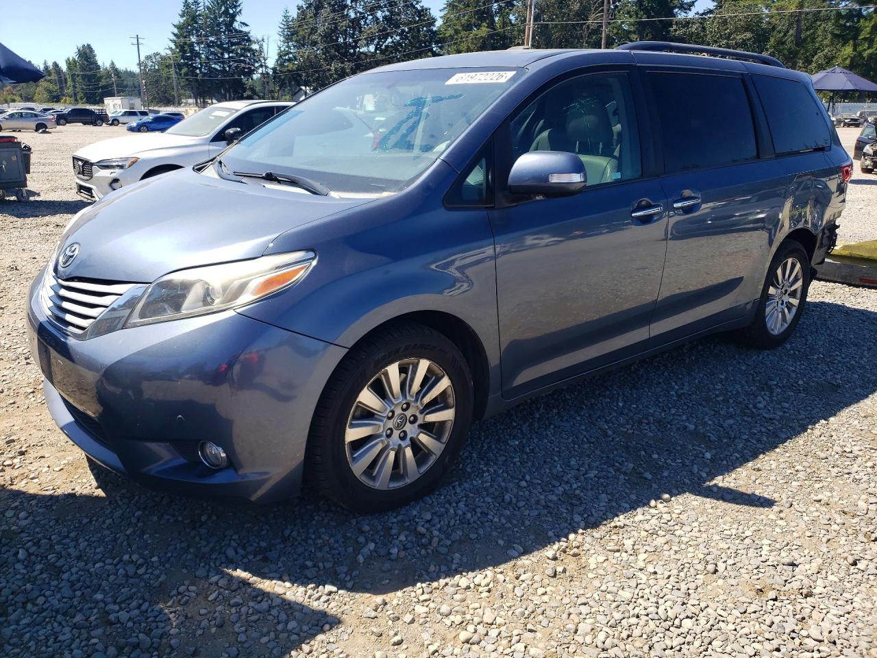 2015 Toyota Sienna XLE, VIN 5TDDK3DC7FS115119 — Rear end