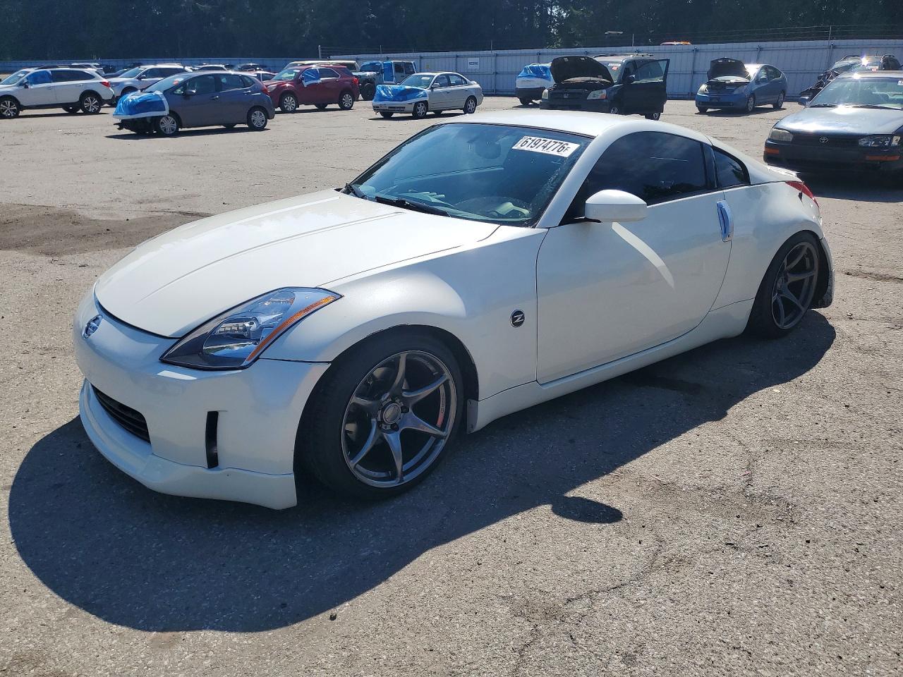 2004 Nissan 350Z Track, VIN JN1AZ34E44M155427 — Зад