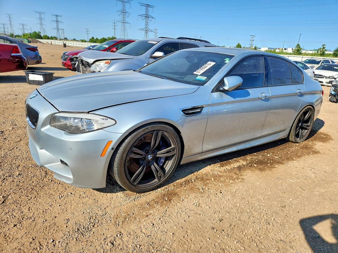 2013 BMW M5, VIN WBSFV9C59DD097018 — Minor dents and scratches
