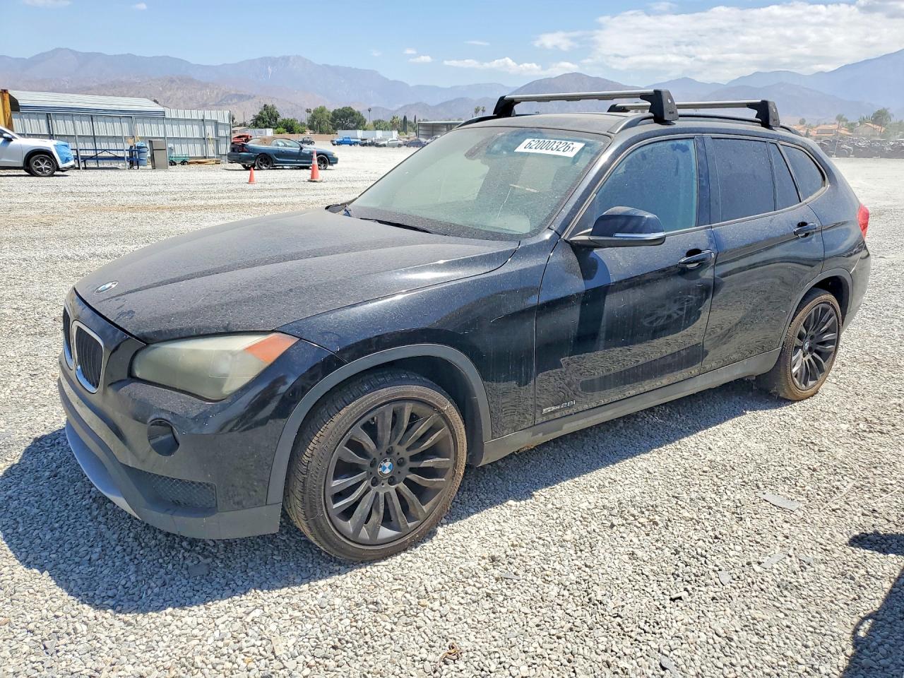 2013 BMW X1 28i, VIN WBAVM1C57DVW46309 — Minor dents and scratches