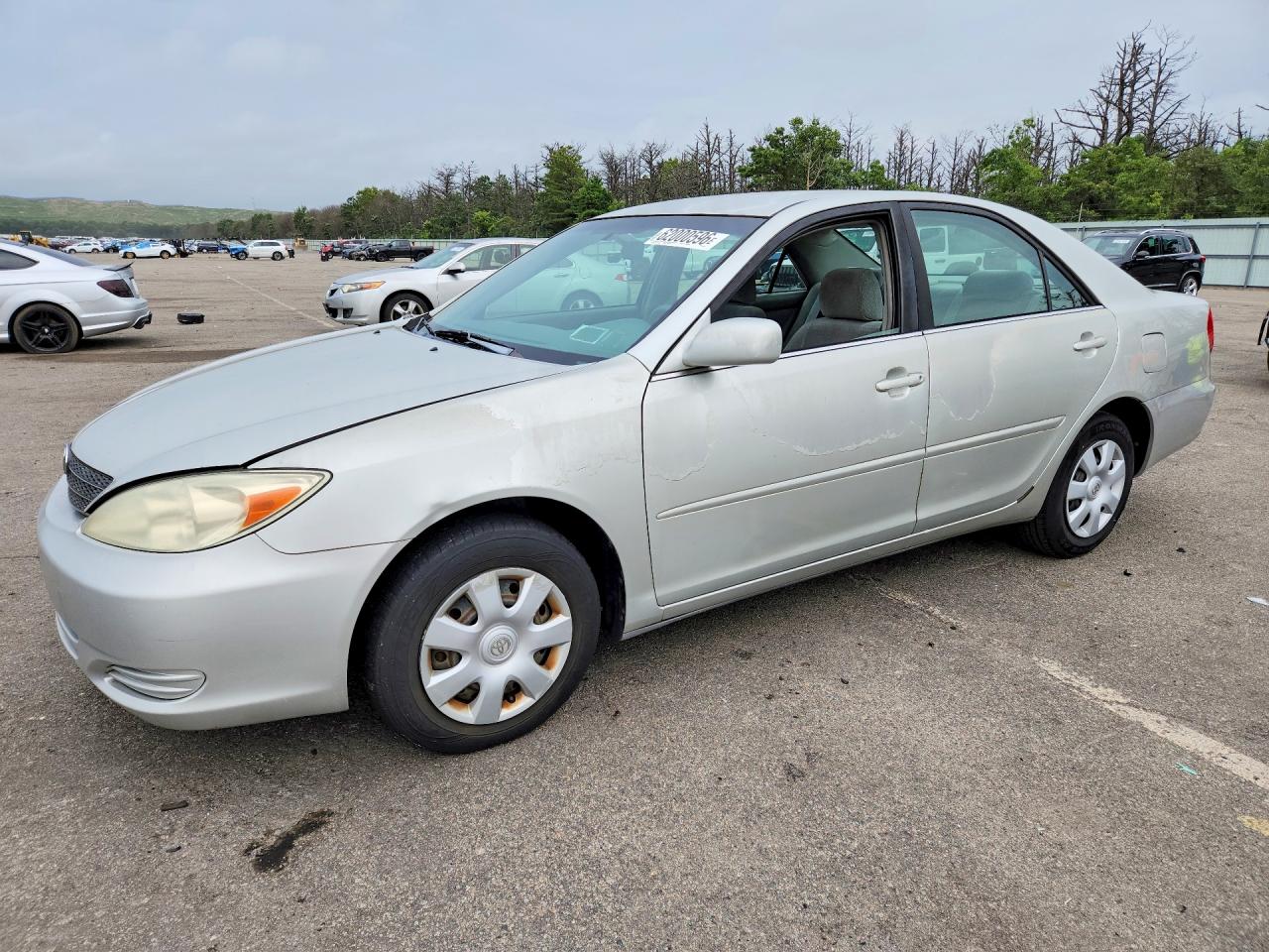 2002 Toyota Camry LE, VIN 4T1BE32K22U092570 — Side