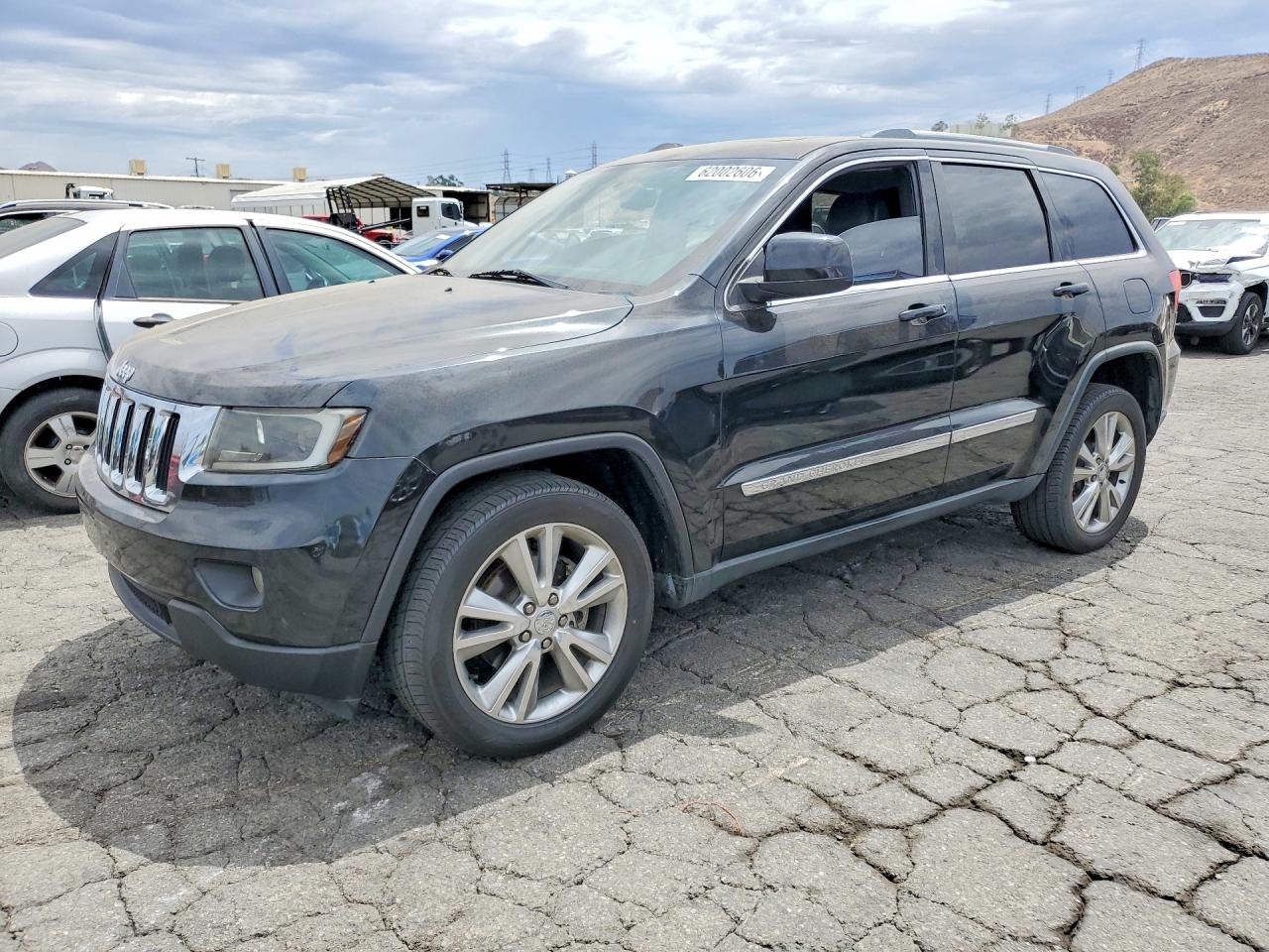 2013 Jeep Grand Cherokee Laredo, VIN 1C4RJEAG4DC504326 — Vandalism