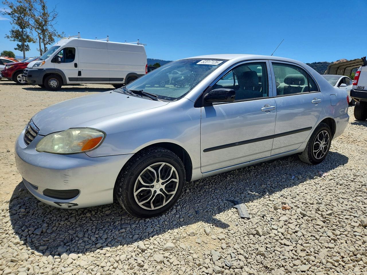 2007 Toyota Corolla CE, VIN 1NXBR32E17Z823818 — Side