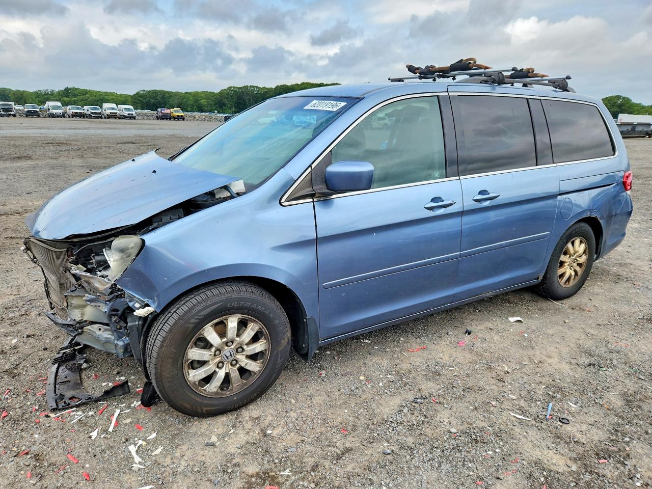 2010 Honda Odyssey EX, VIN 5FNRL3H47AB059279 — Front end