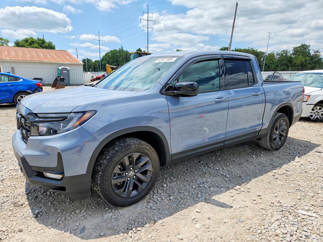 2025 Honda Ridgeline Sport, VIN 5FPYK3F16SB000661 — Side