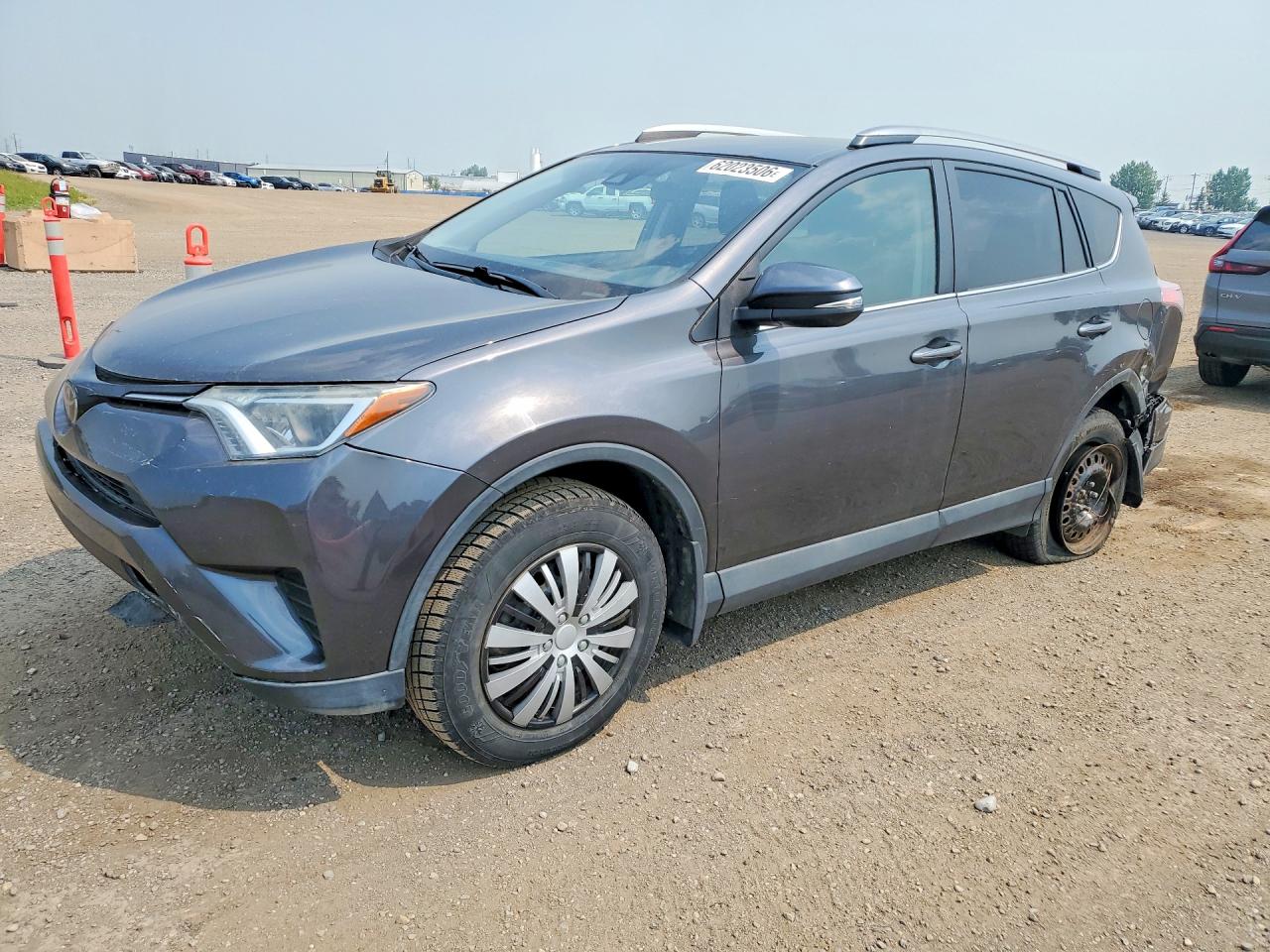 2018 Toyota RAV4 LE, VIN 2T3BFREV3JW845275 — Rear end