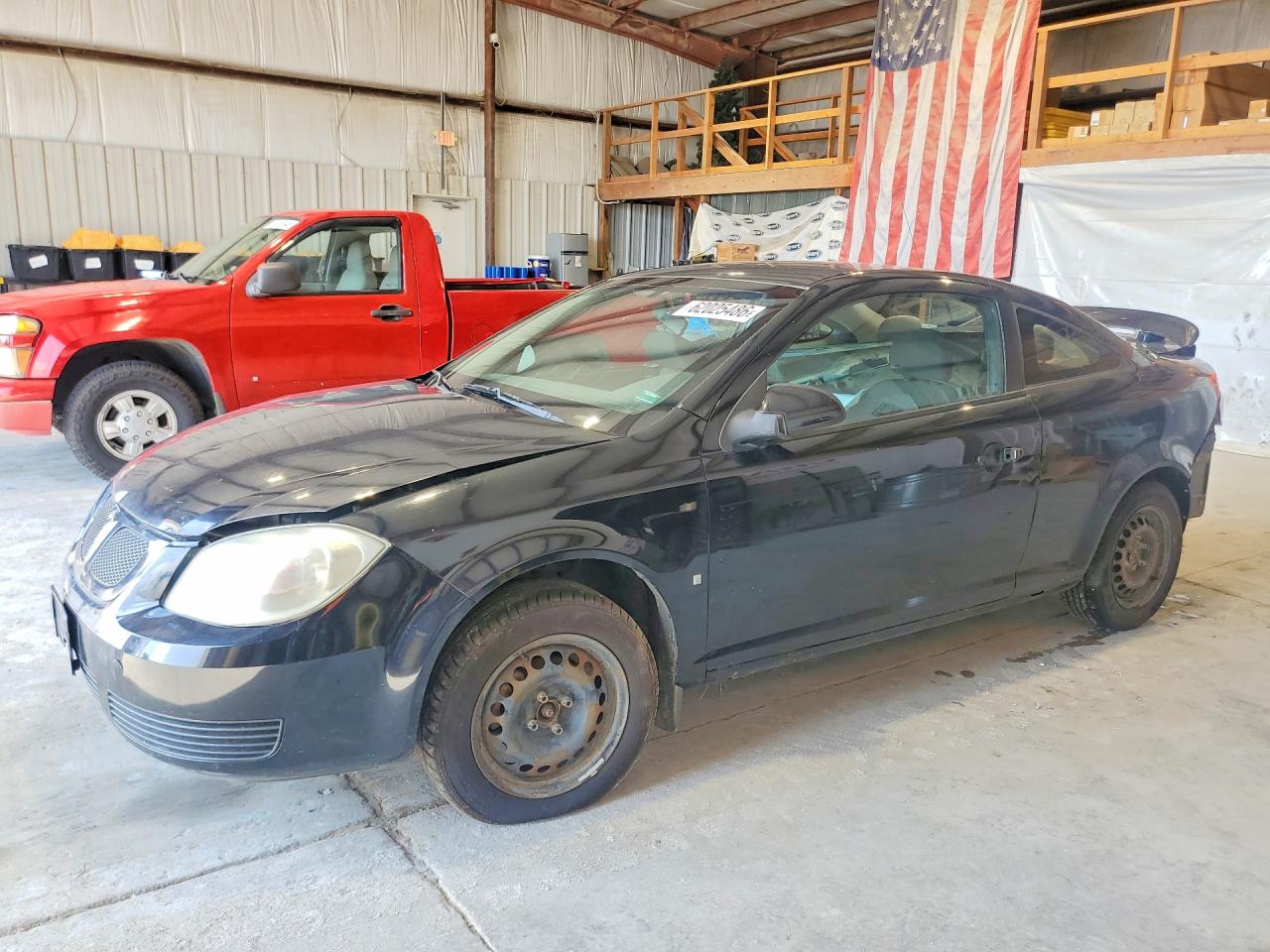 2007 Pontiac G5, VIN 1G2AL15FX77228110 — Зад
