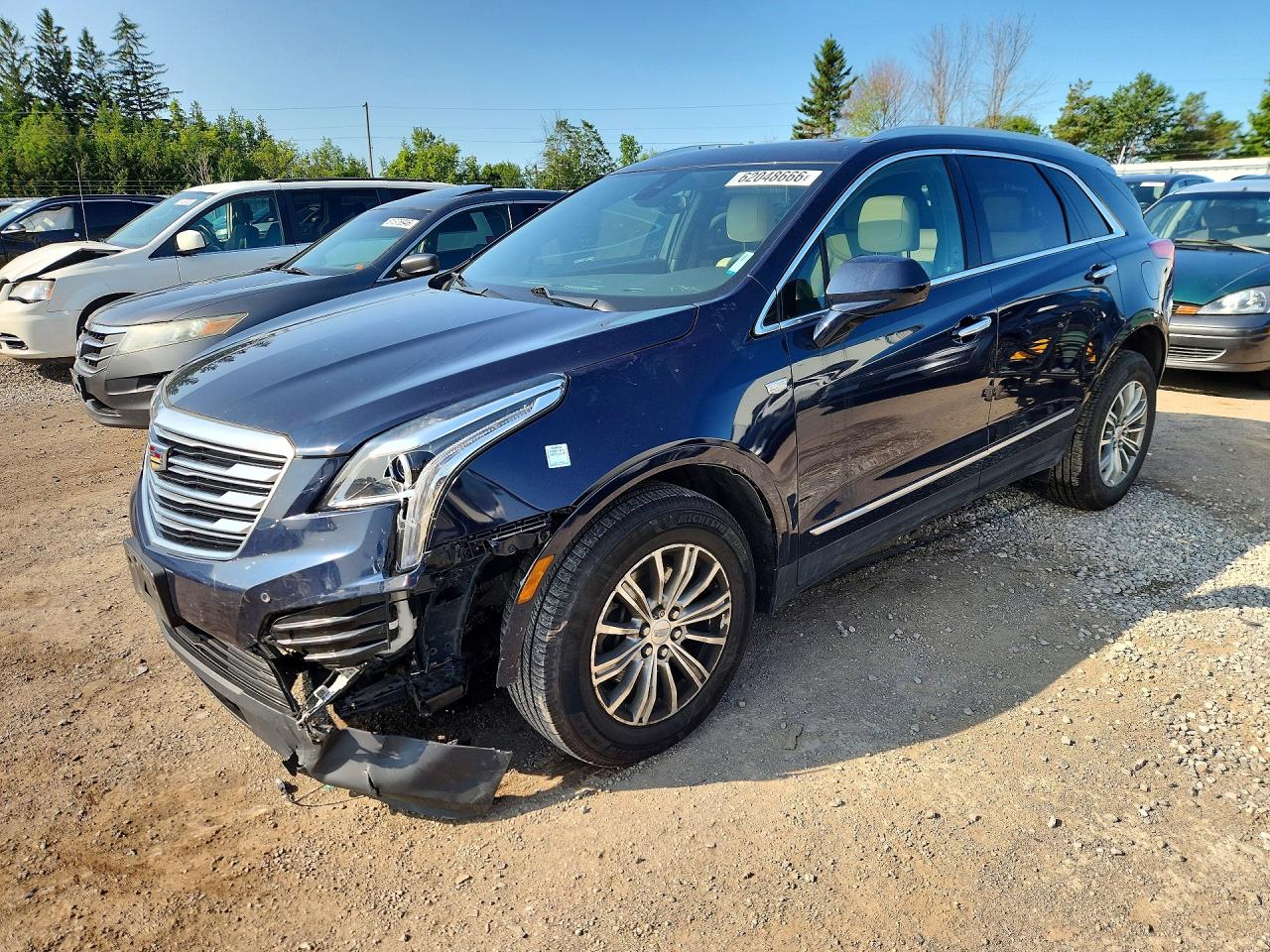 2017 Cadillac XT5 Luxury AWD, VIN 1GYKNDRSXHZ309224 — Front end