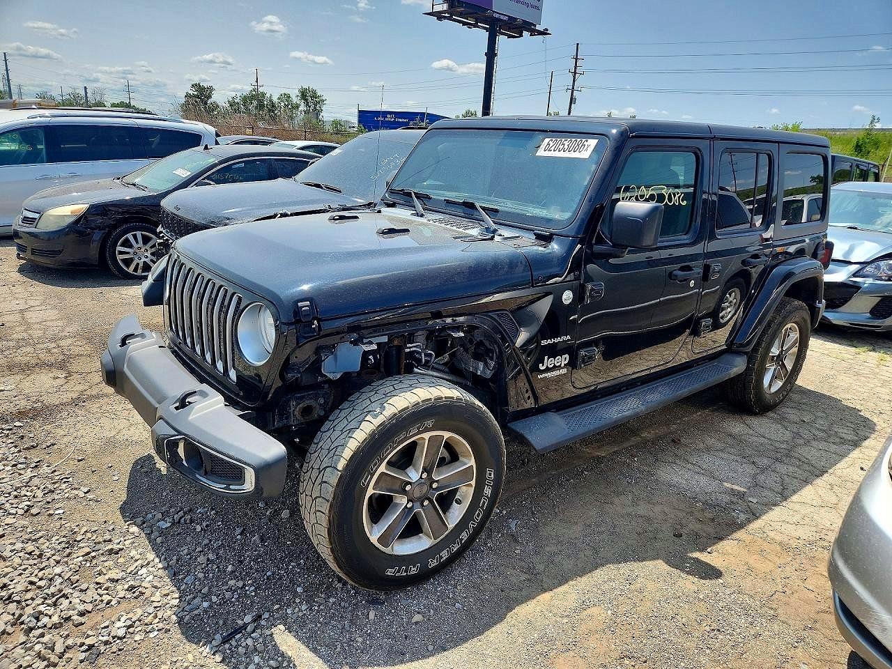 2018 Jeep Wrangler Unlimited Sahara, VIN 1C4HJXEN9JW201648 — Front end