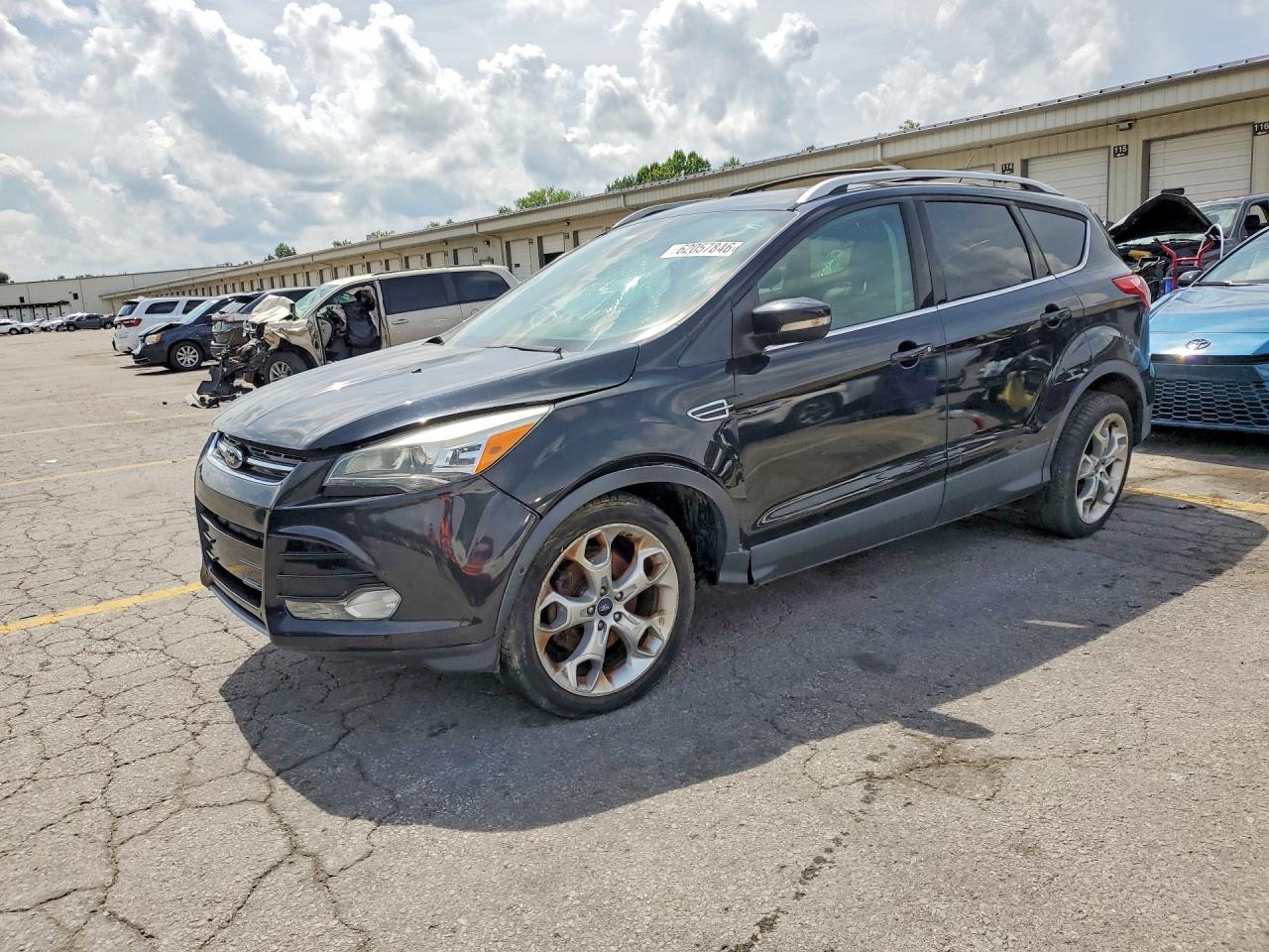 2015 Ford Escape Titanium, VIN 1FMCU0J93FUA50483 — Side