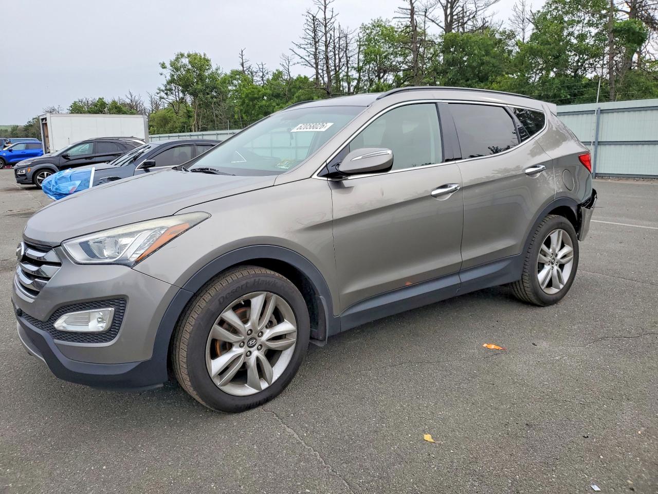 2013 Hyundai Santa Fe Sport, VIN 5XYZUDLA5DG088616 — Rear end