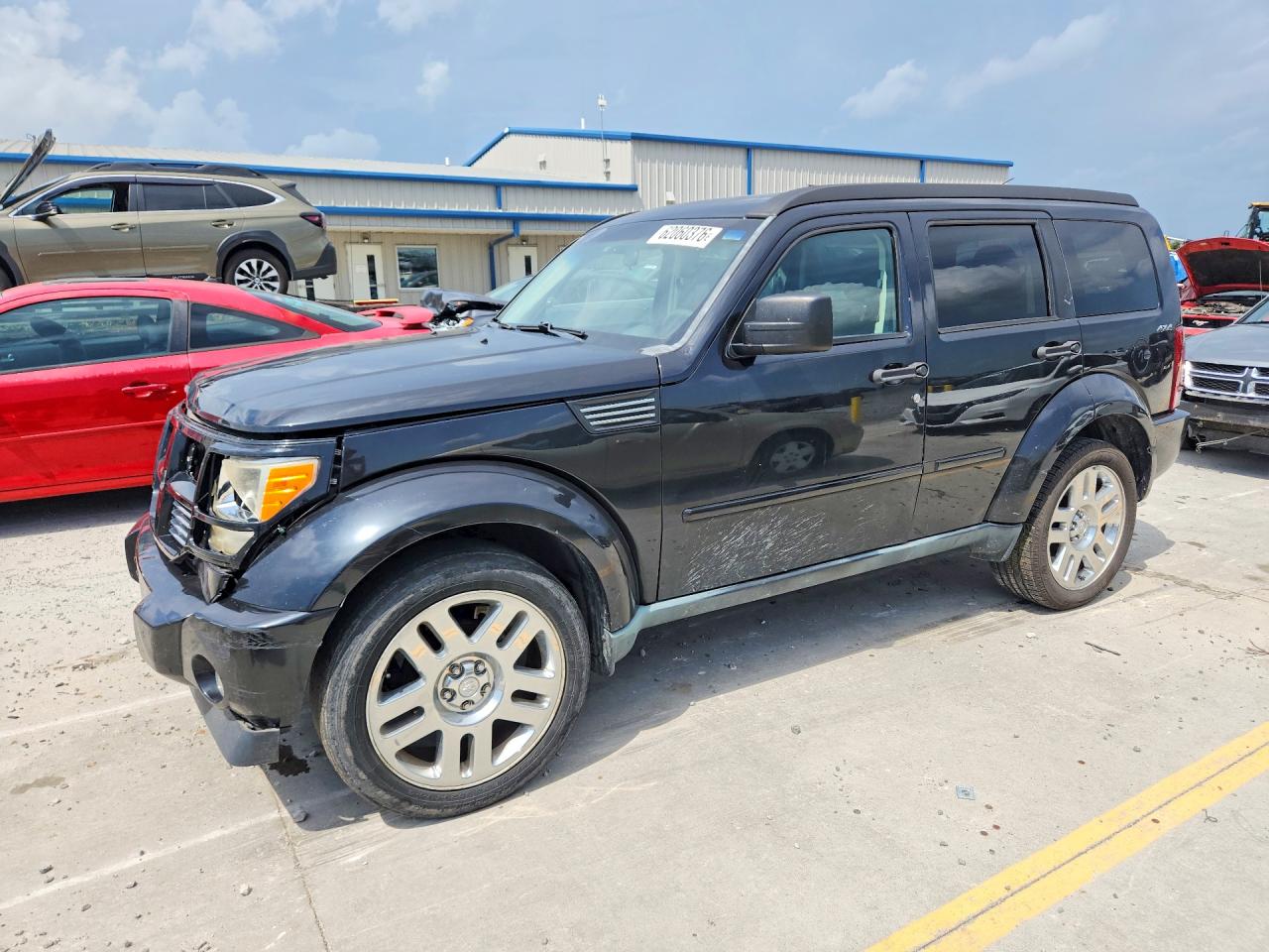 2011 Dodge Nitro Heat, VIN 1D4PU4GK0BW598630 — Front end