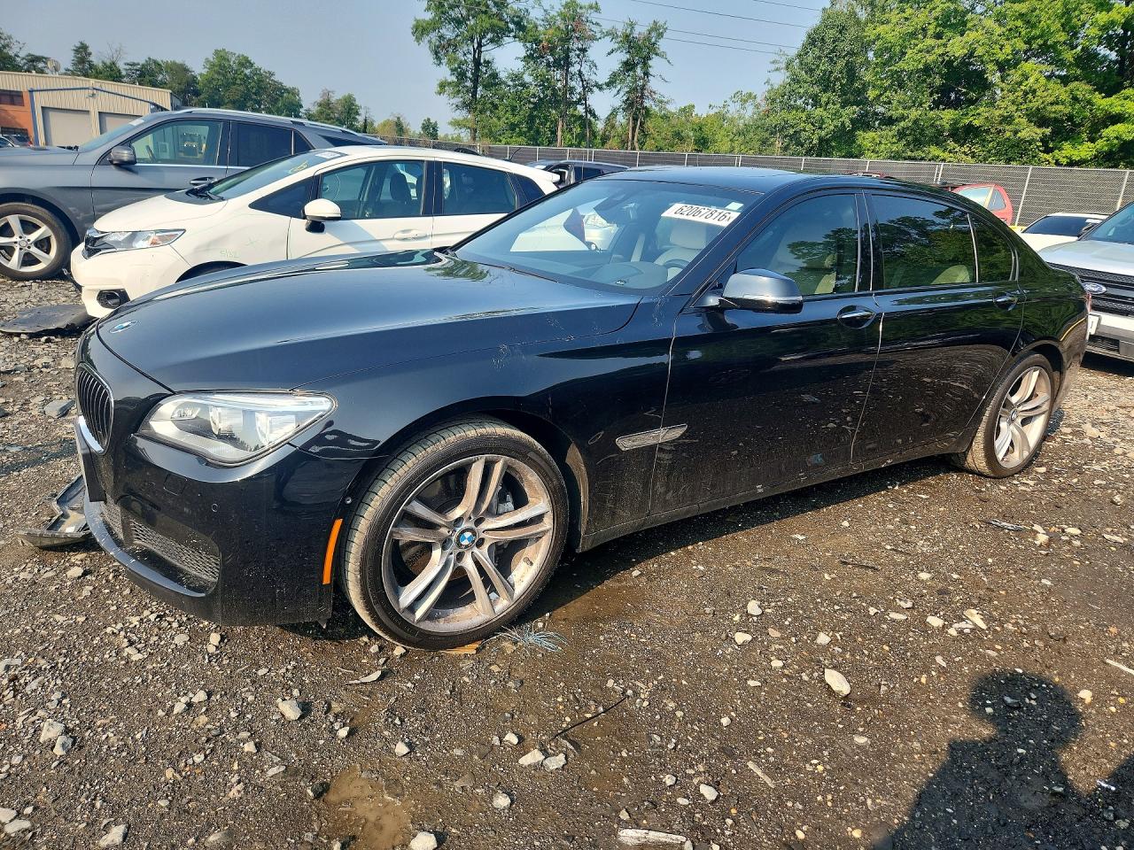 2015 BMW 7 Series 740Li xDrive, VIN WBAYF4C56FD874013 — Rear end