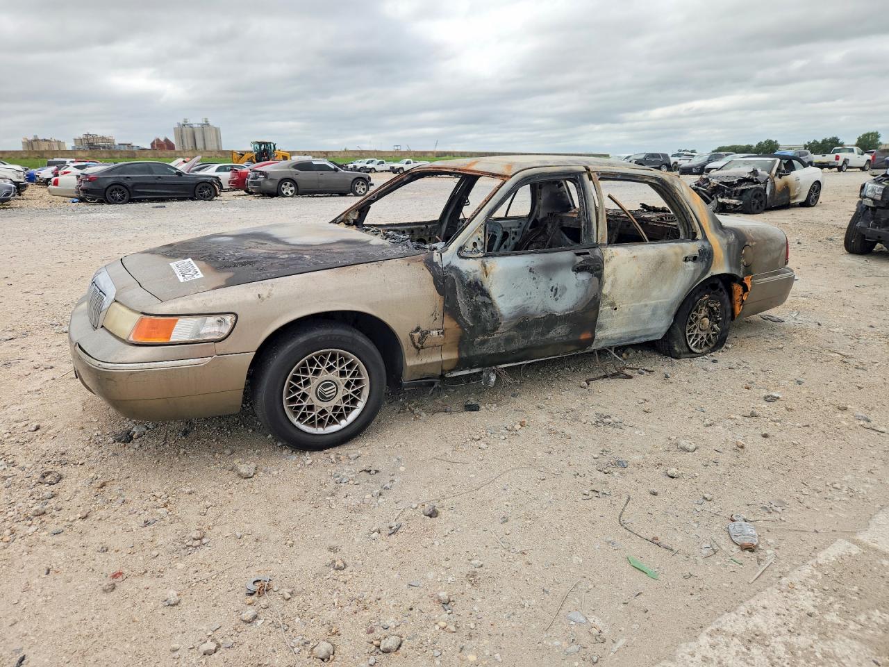 2002 Mercury Grand Marquis GS, VIN 2MEFM74W82X653474 — Burn