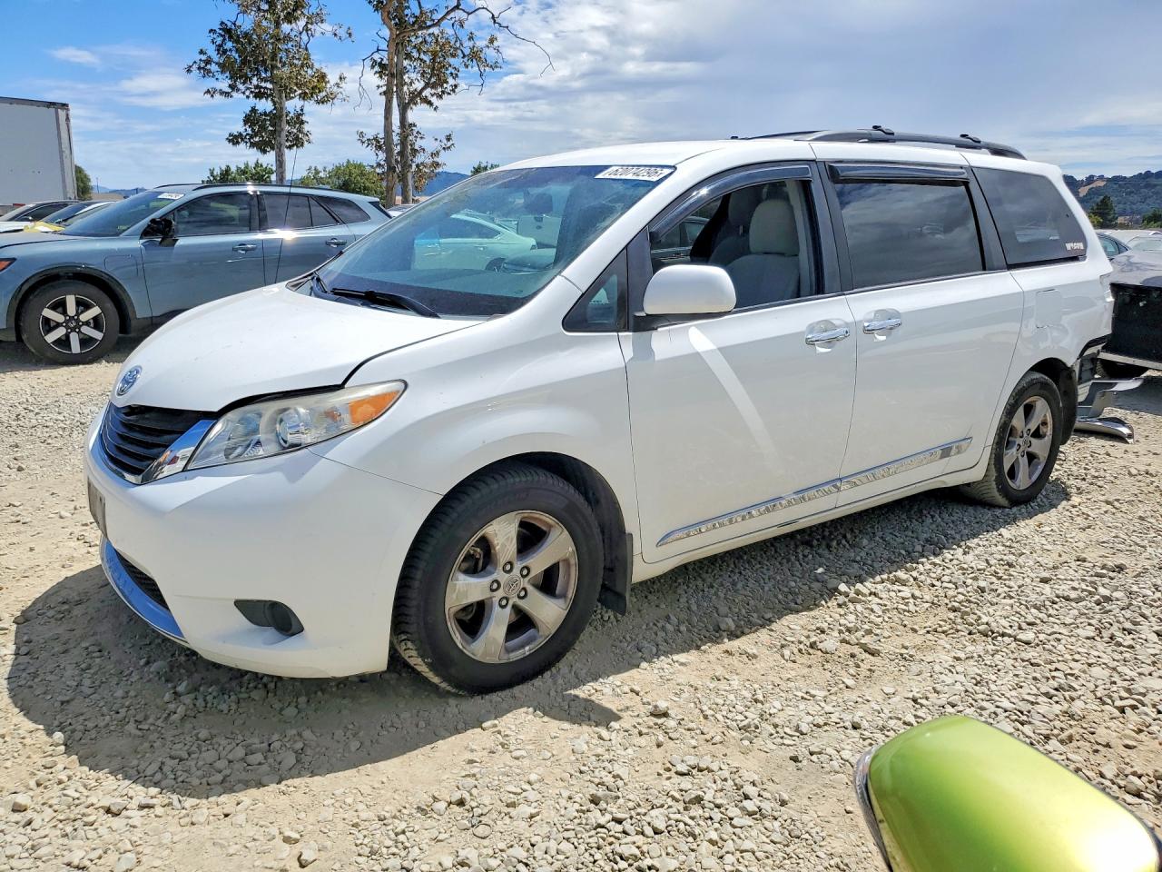 2012 Toyota Sienna LE, VIN 5TDKK3DC6CS272935 — Rear end