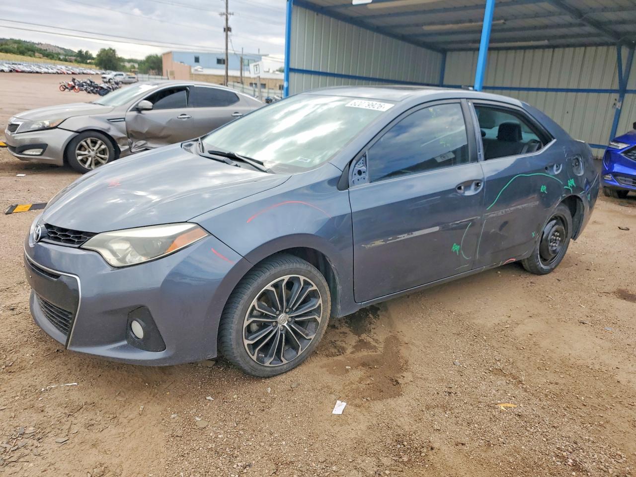 2014 Toyota Corolla LE, VIN 5YFBURHE9EP099285 — Side
