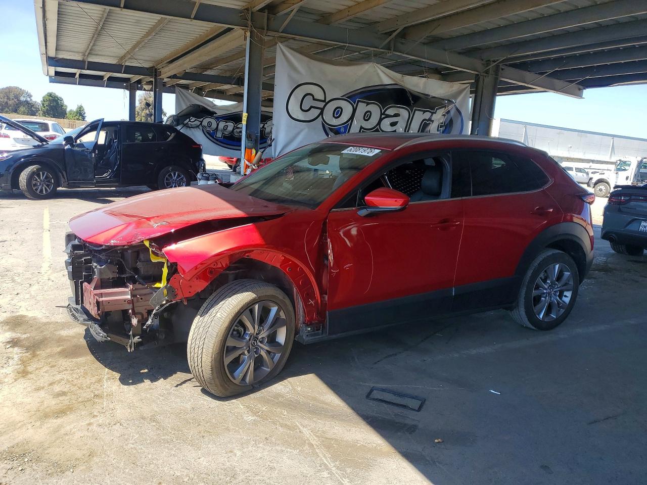2021 Mazda CX-30 Premium, VIN 3MVDMBDL8MM307763 — Front end