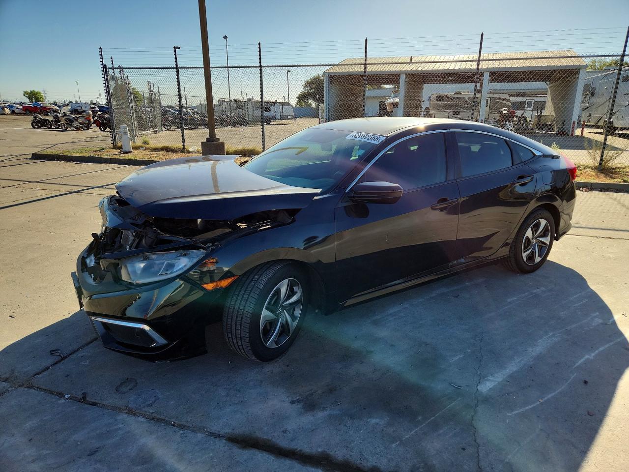 2019 Honda Civic LX, VIN 19XFC2F62KE210747 — Undercarriage