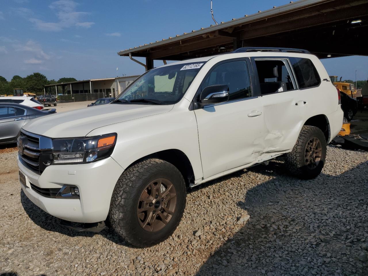 2021 Toyota Land Cruiser, VIN JTMCY7AJ9M4106015 — Side