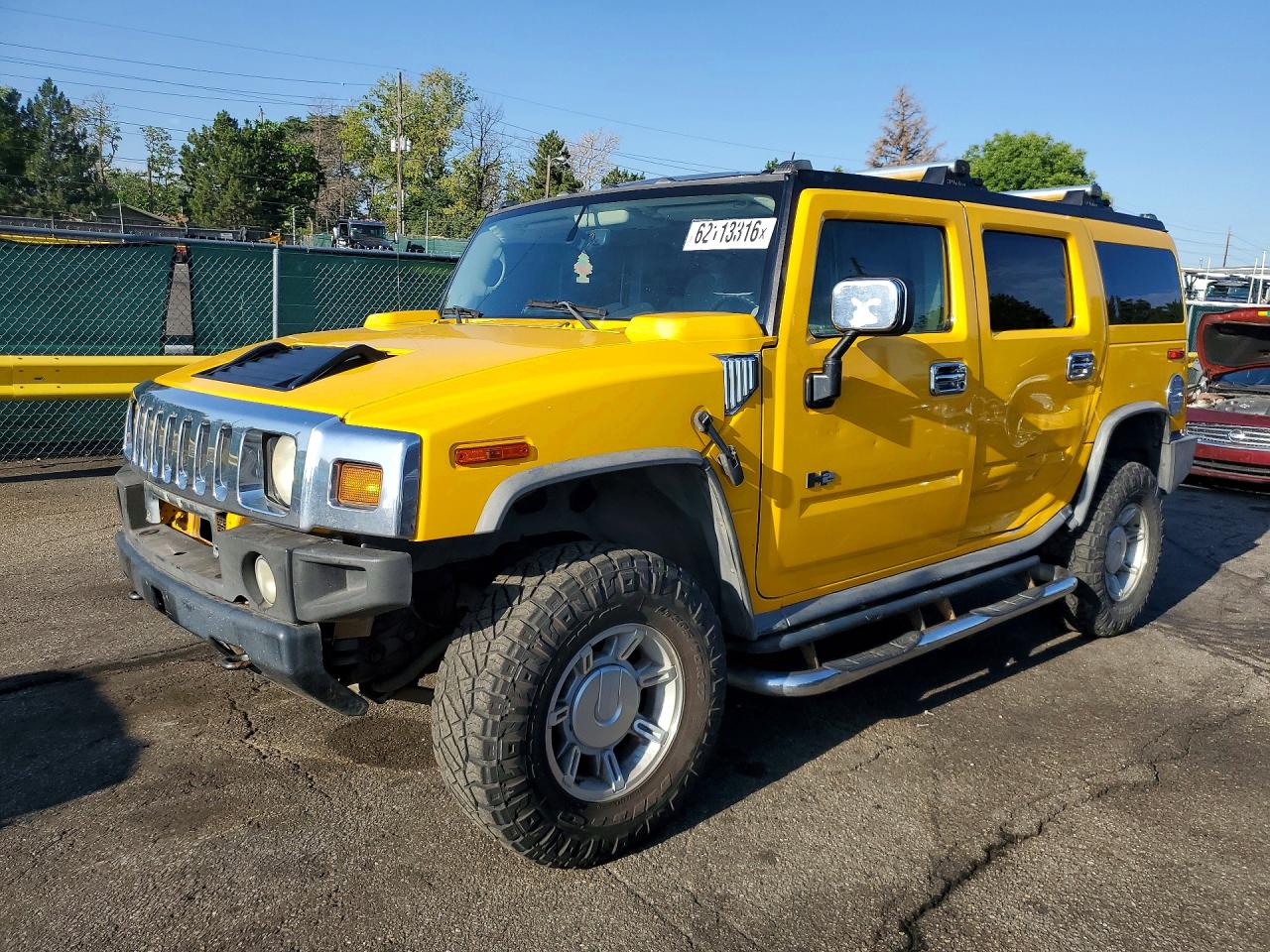 2004 Hummer H2, VIN 5GRGN23U34H121668 — Side