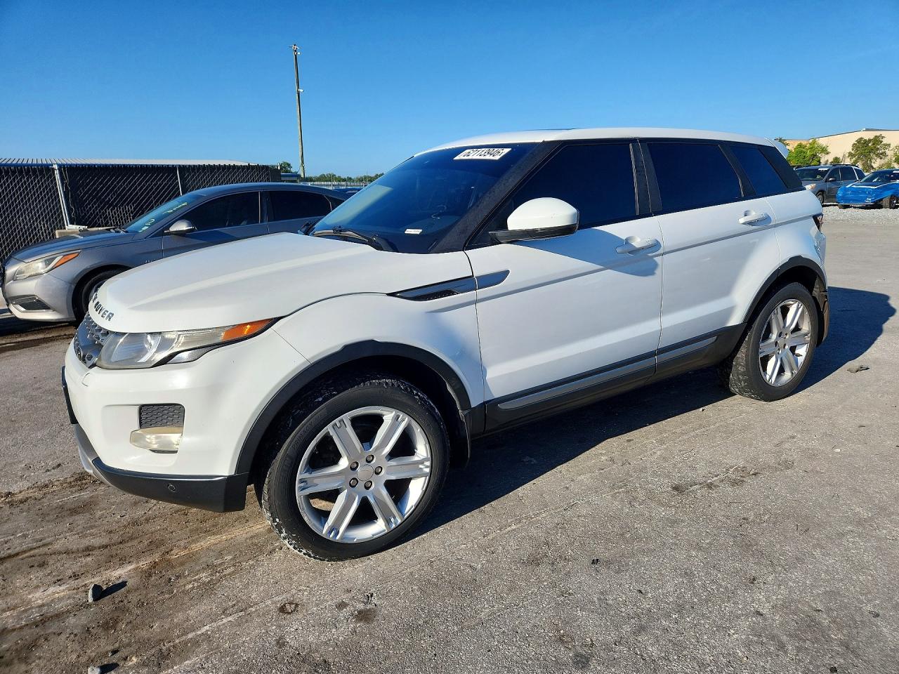 2014 Land Rover Range Rover Evoque Pure Plus, VIN SALVP2BG9EH892077 — Minor dents and scratches