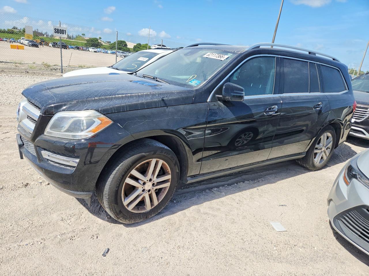 2014 Mercedes-Benz GL 450, VIN 4JGDF7CE9EA280434 — Vandalism