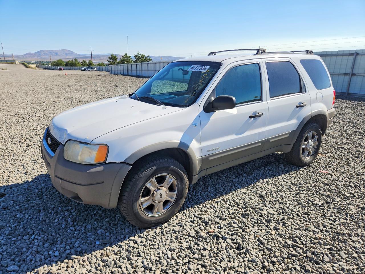 2002 Ford Escape XLT Choice, VIN 1FMCU04102KA79340 — Бок