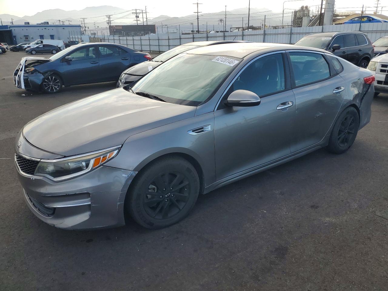 2016 Kia Optima LX, VIN 5XXGT4L31GG071526 — Rear end