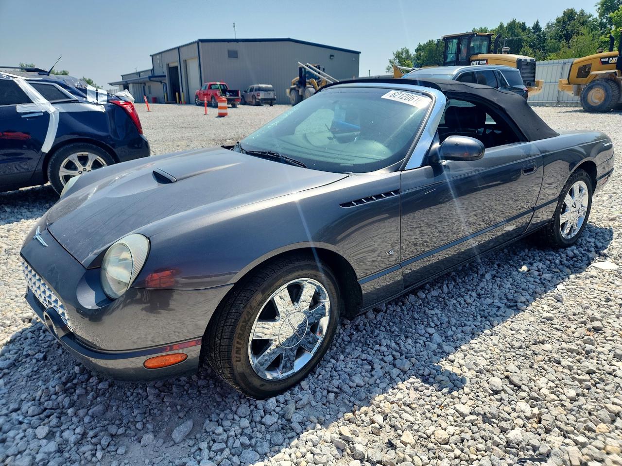 2003 Ford Thunderbird Deluxe, VIN 1FAHP60A63Y100741 — Side