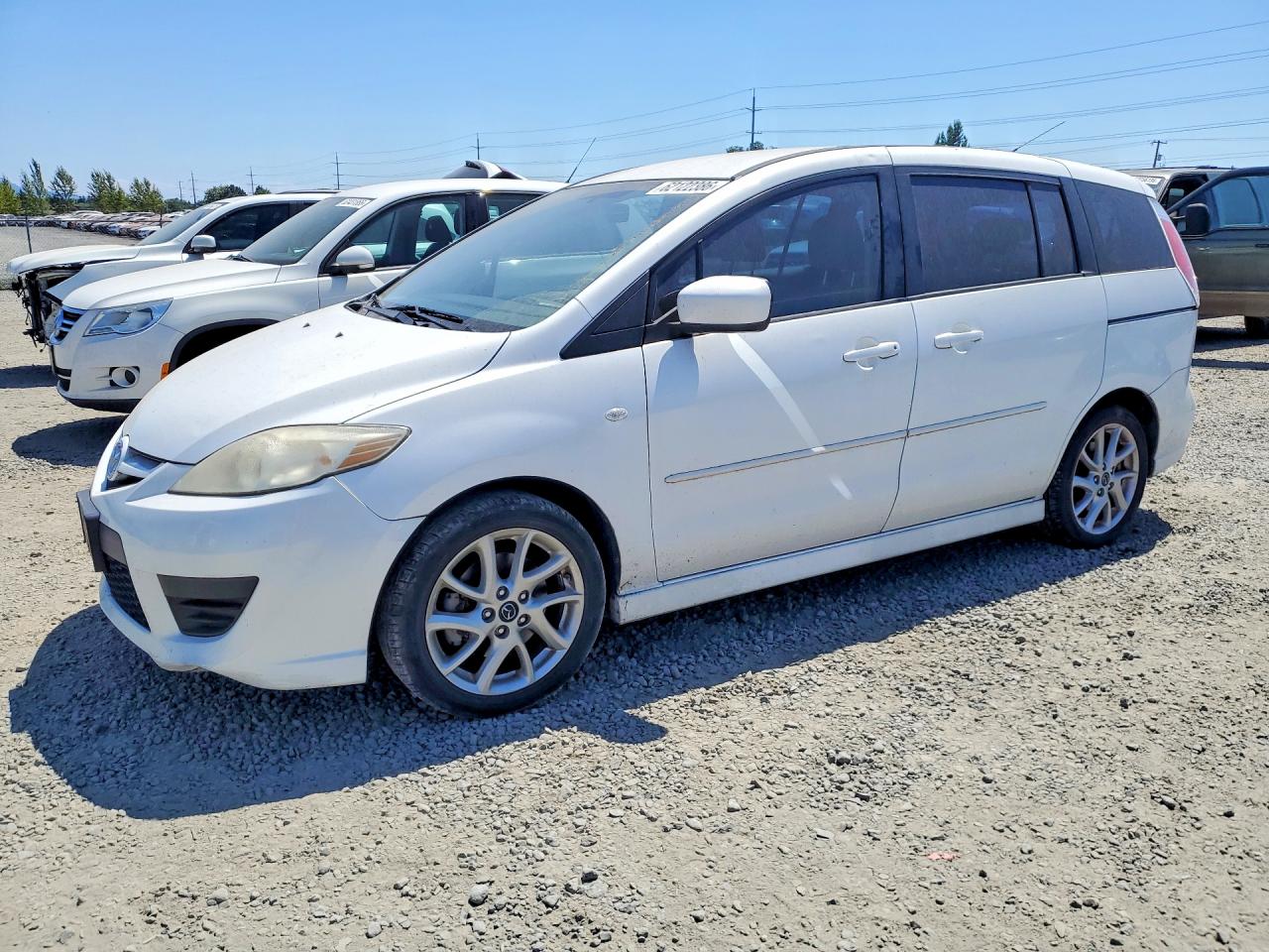 2009 Mazda 5 Touring, VIN JM1CR29L690347857 — Front end