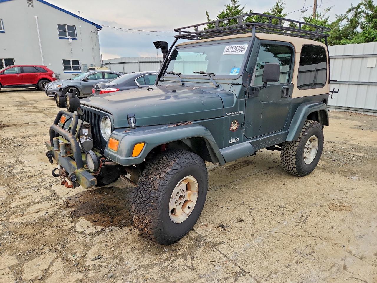 2002 Jeep Wrangler Sahara, VIN 1J4FA59S22P730151 — Normal wear