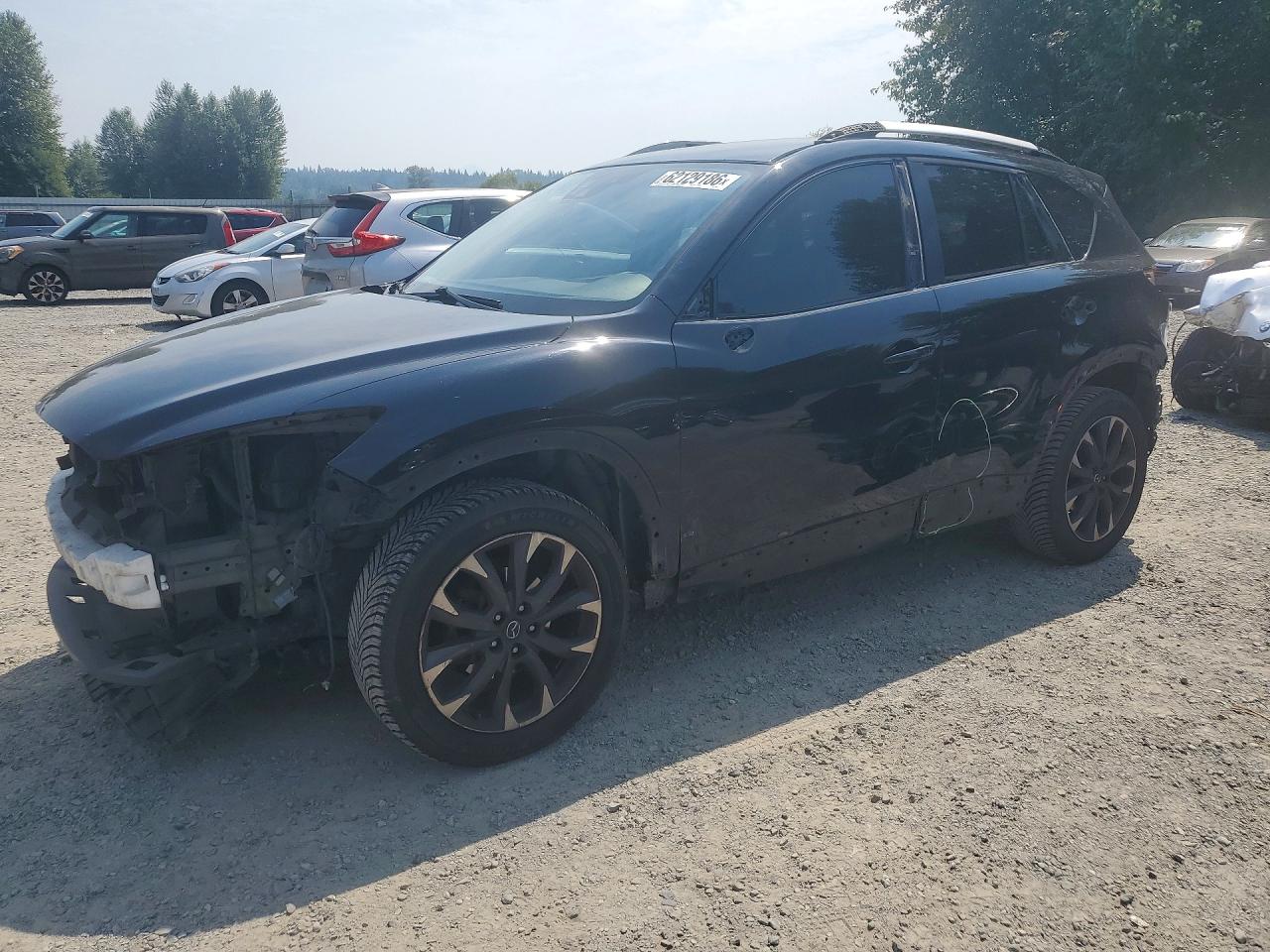2016 Mazda CX-5 Grand Touring, VIN JM3KE4DYXG0799322 — Front end