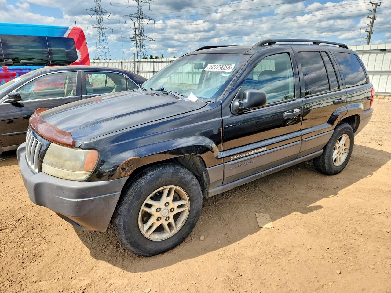 2004 Jeep Grand Cherokee Laredo, VIN 1J4GW48SX4C401189 — Normal wear