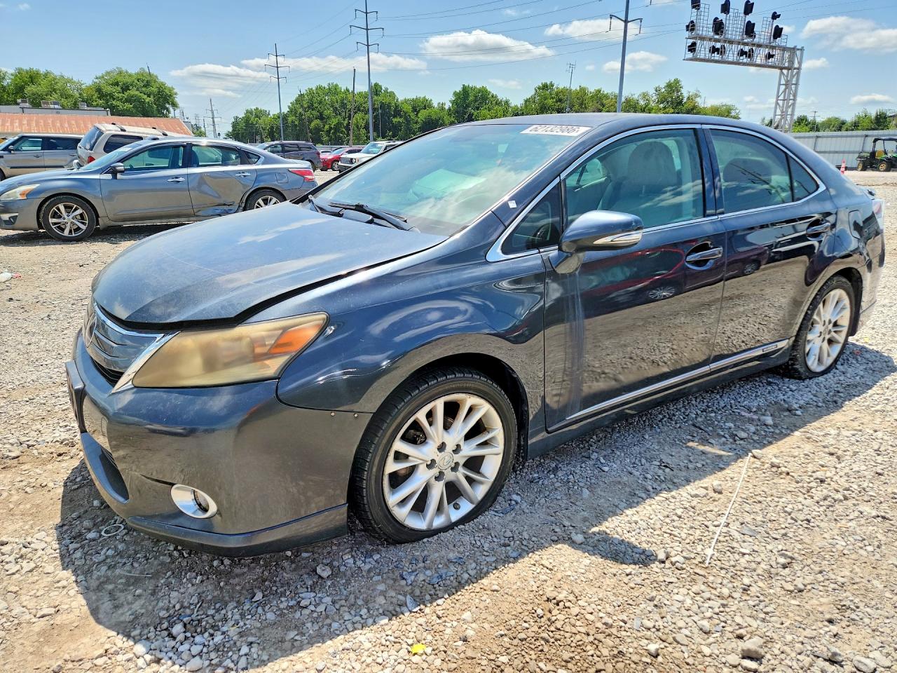 2010 Lexus HS 250h Premium, VIN JTHBB1BA1A2003153 — Front end